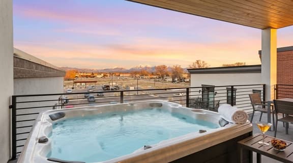 Top-Floor Condo with Hot Tub & Mountain Views